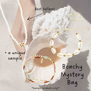 Beach themed jewellery bag, with a white necklace with a starfish on, a shell bracelet, a beaded stretchy ring, and a brown and fold beaded bracelet as example products.