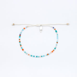 Colorful beaded necklace on a white background