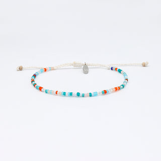 Colorful beaded bracelet on a white background