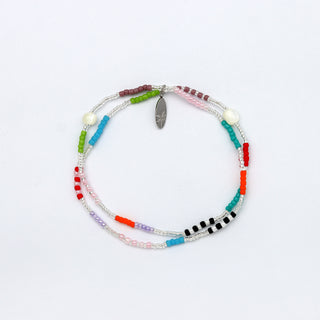 Multicolored beaded bracelet on a white background