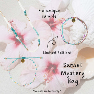Sunset themed jewellery bag, with a white and blue necklace, and two colourful beaded bracelets as example products.